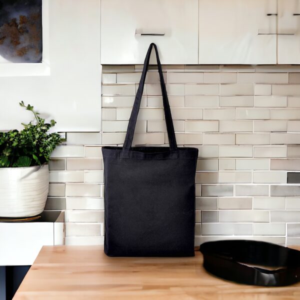 Customize your tote bag with your own text or image! Whether you need a personalized tote bag for yourself, promotional purposes, or as a trade show gift, we've got you covered. Our custom shopper bags are perfect for all your shopping needs. Black Colour - Image 3